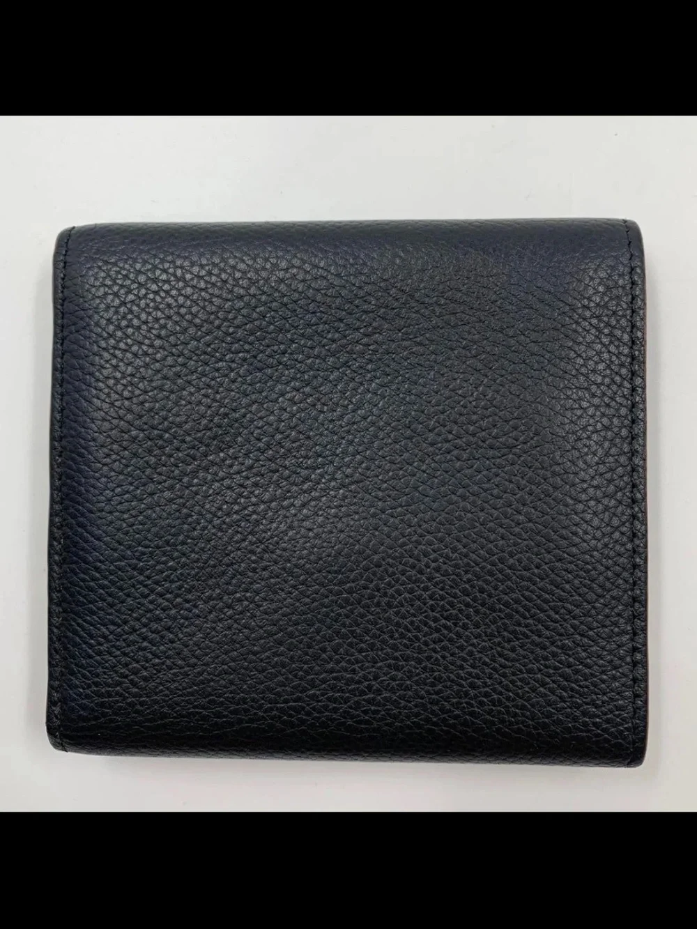 Loewe compact trifold