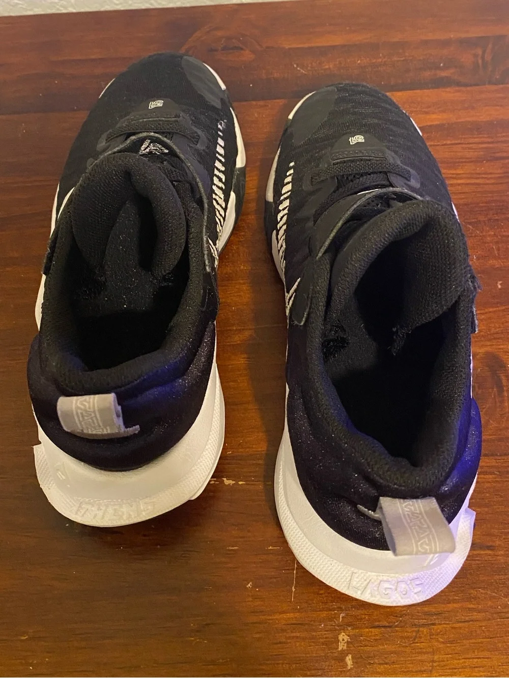 Nike Kids Black Sneakers with White Soles and Lime Accent