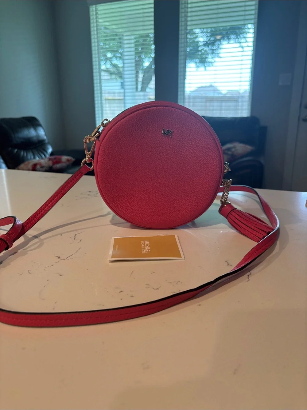 NWOT Michael Kors Coral Pink Round Crossbody Bag with Tassel