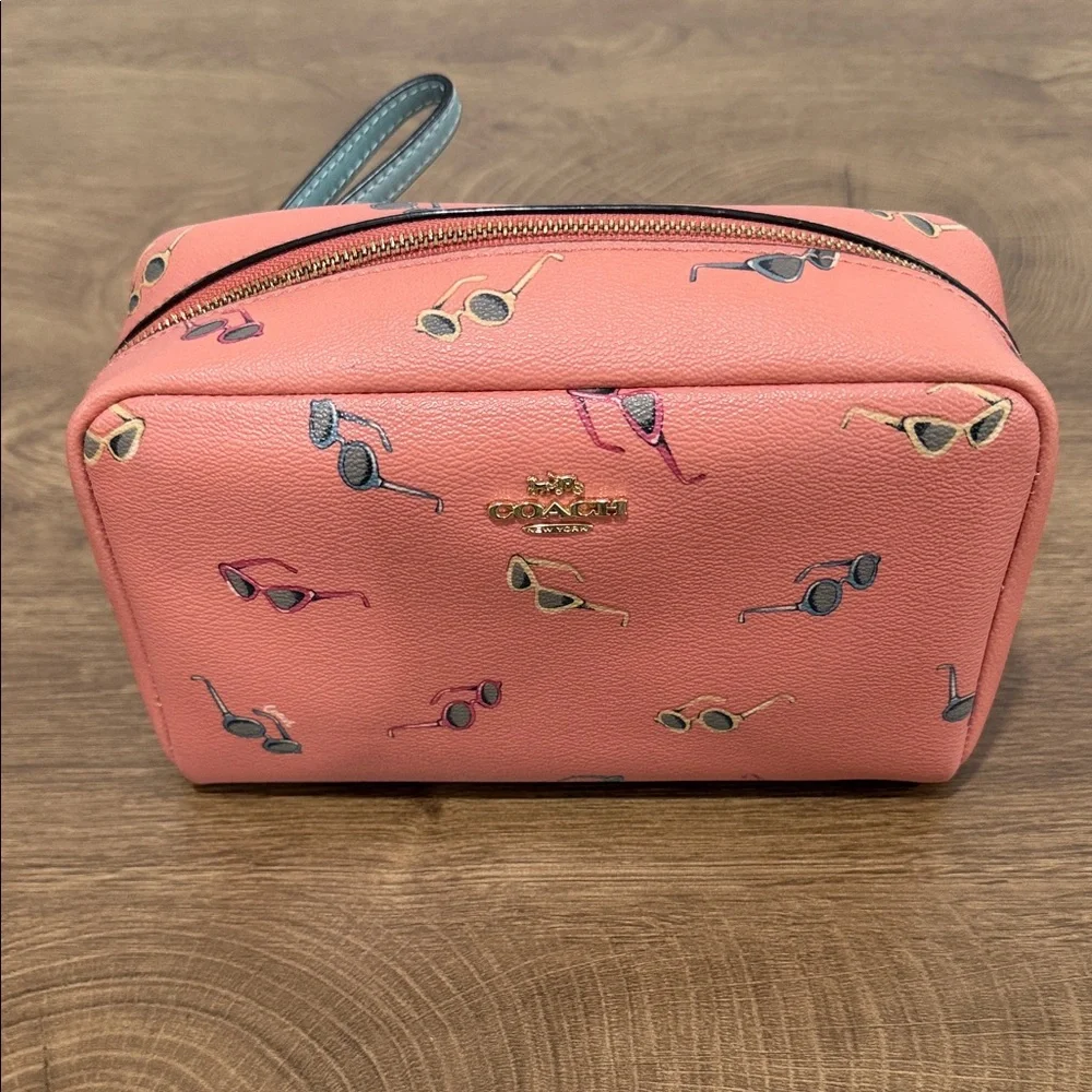 Coach pink cosmetic gold