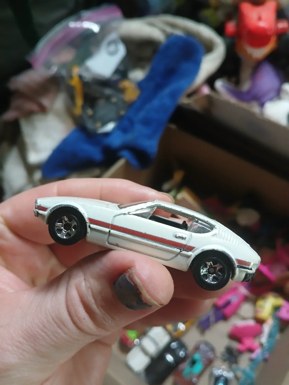 2012 Hot Wheels Volkswagen SP2. It features a pearl white body