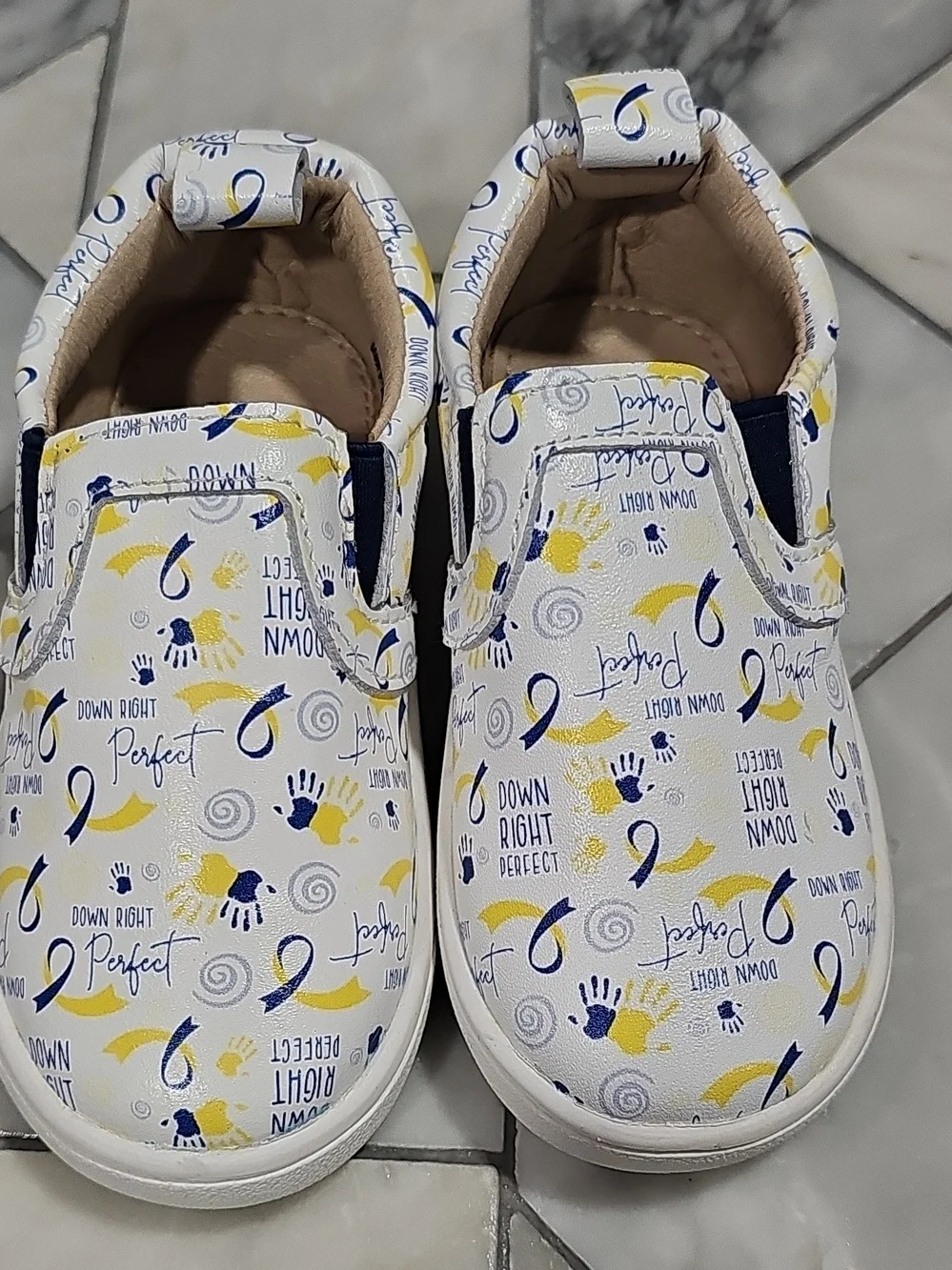 Monkey Feet White Slip-On Sneakers with Blue & Yellow Prints 12-18 Months