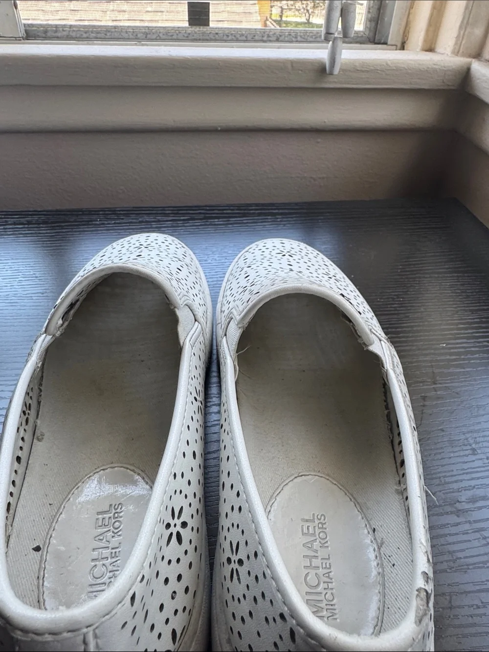 Michael Kors White Perforated Slip-On Sneakers with Floral Cutouts