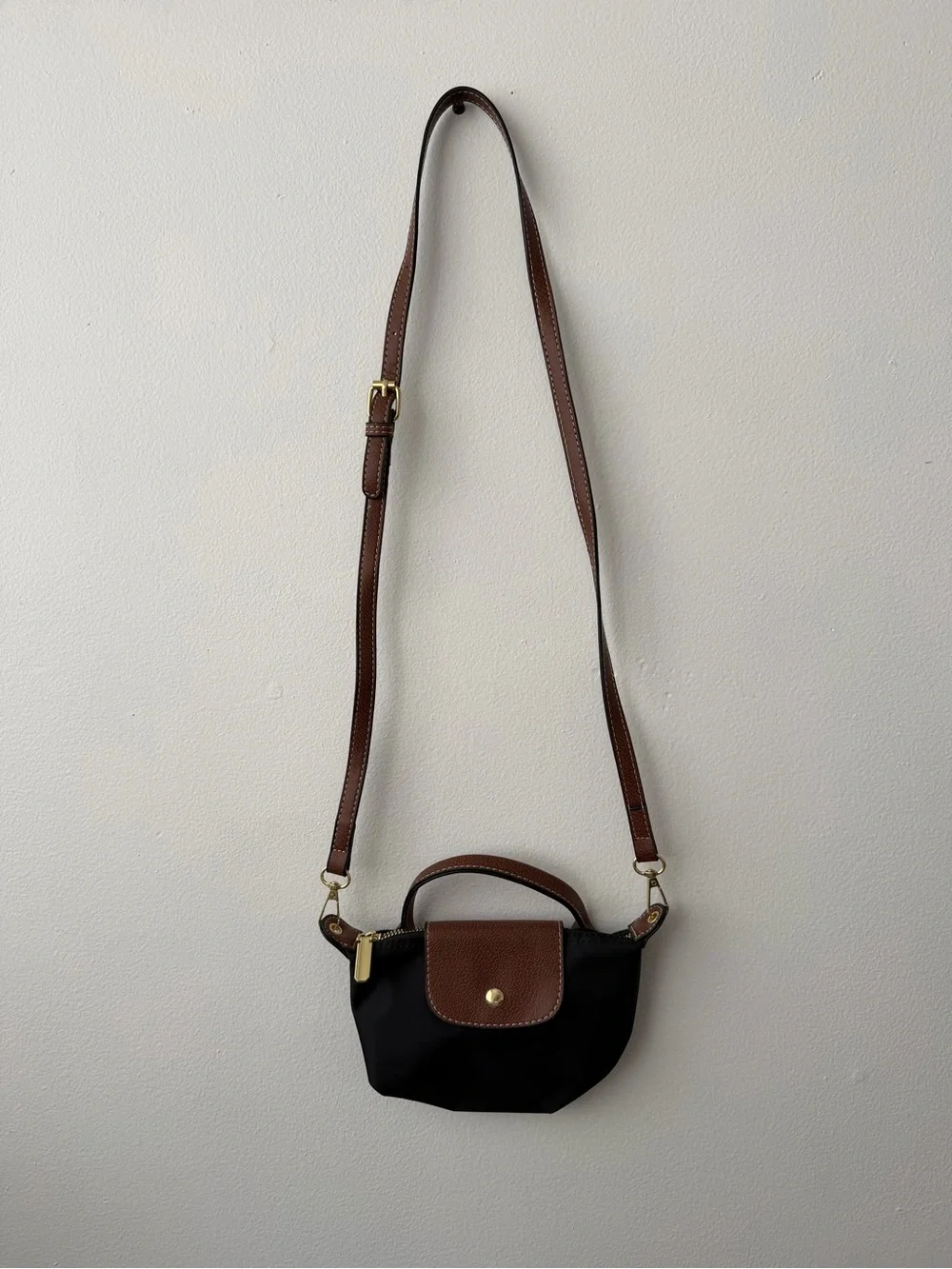 Black and Brown Compact Crossbody Bag with Adjustable Strap