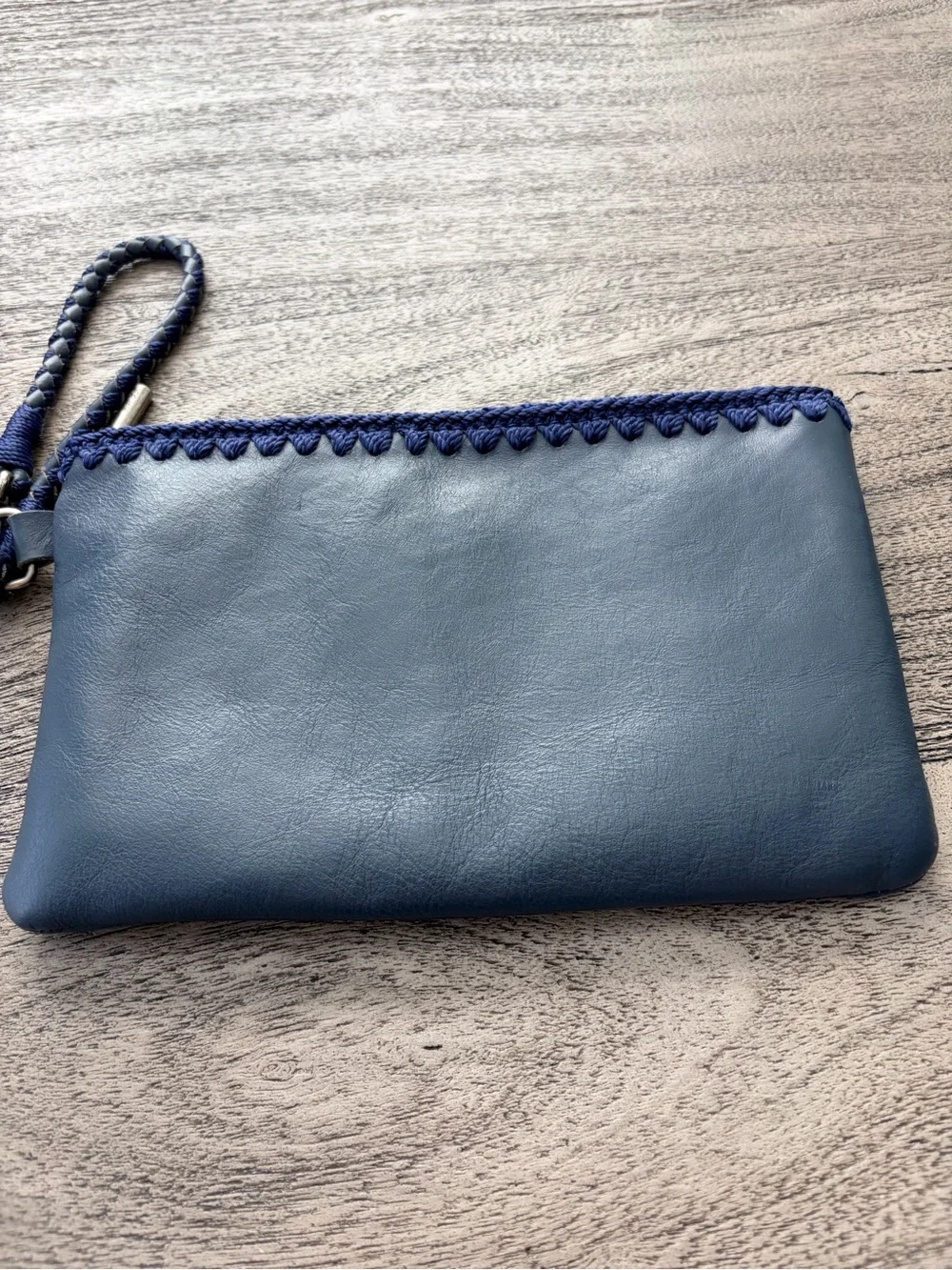 The Sak Vita Blue Leather Boho Wristlet with Crochet Trim EUC