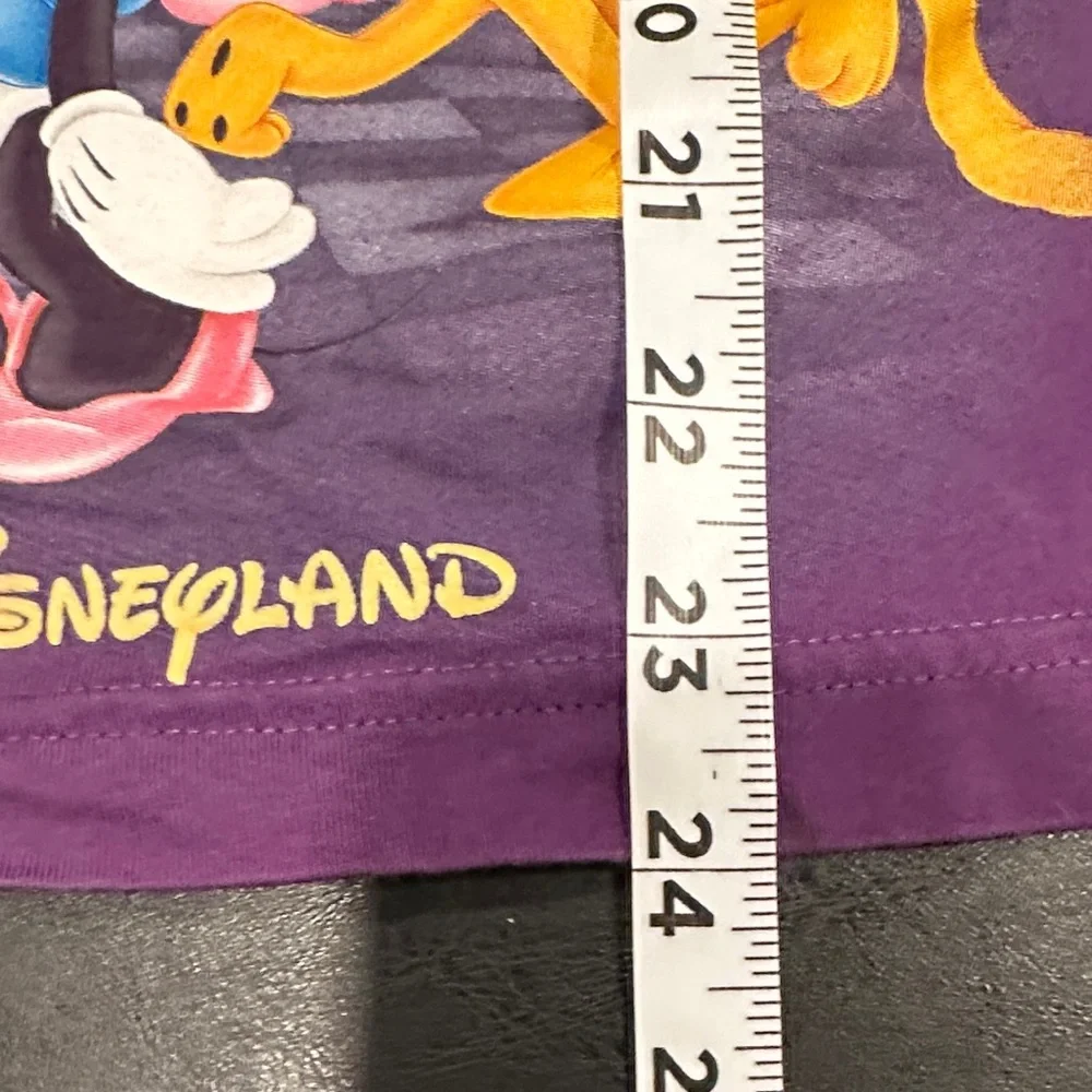 Disney fans showcasing tee