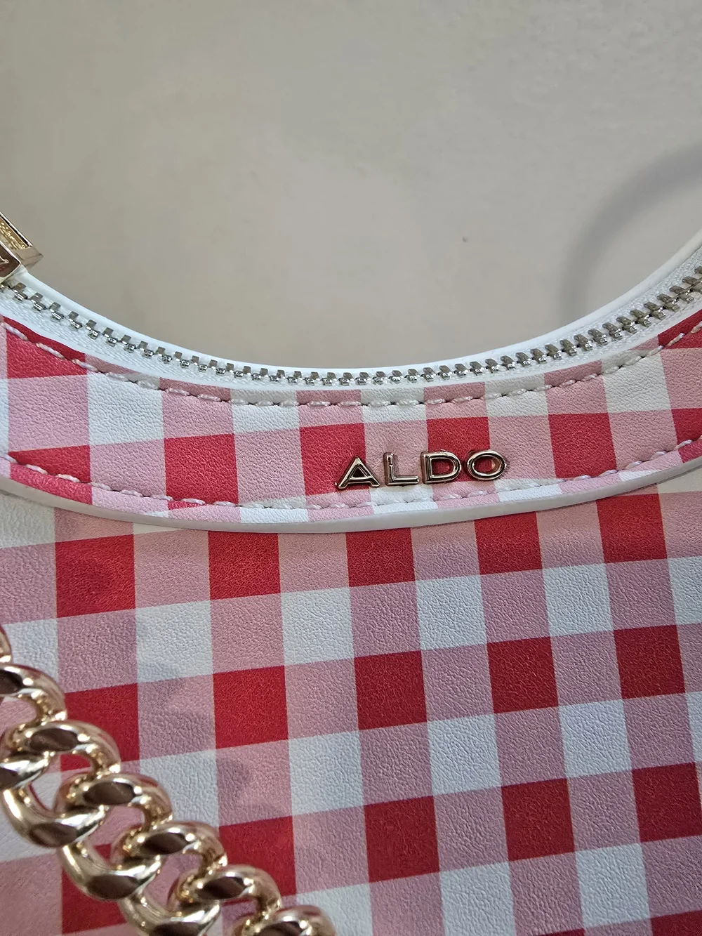 Aldo crescent style