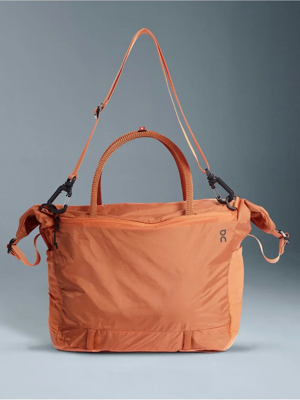 On Running Orange Track Pack 35L Lite