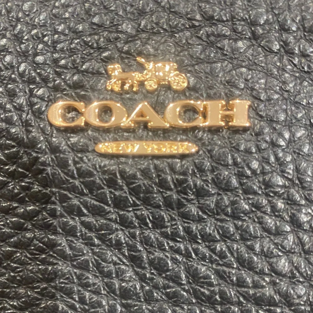 Coach sleek black