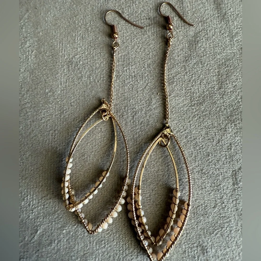 Elegant Gold and Cream Dangle Earrings