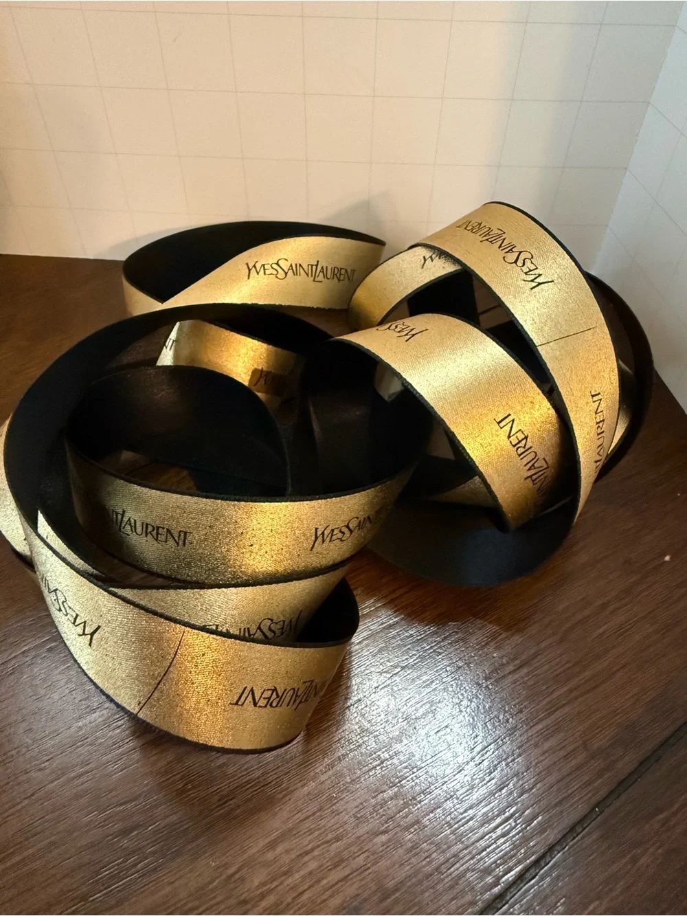 Yves Saint Laurent Metallic Gold and Black Branded Ribbon 1”
