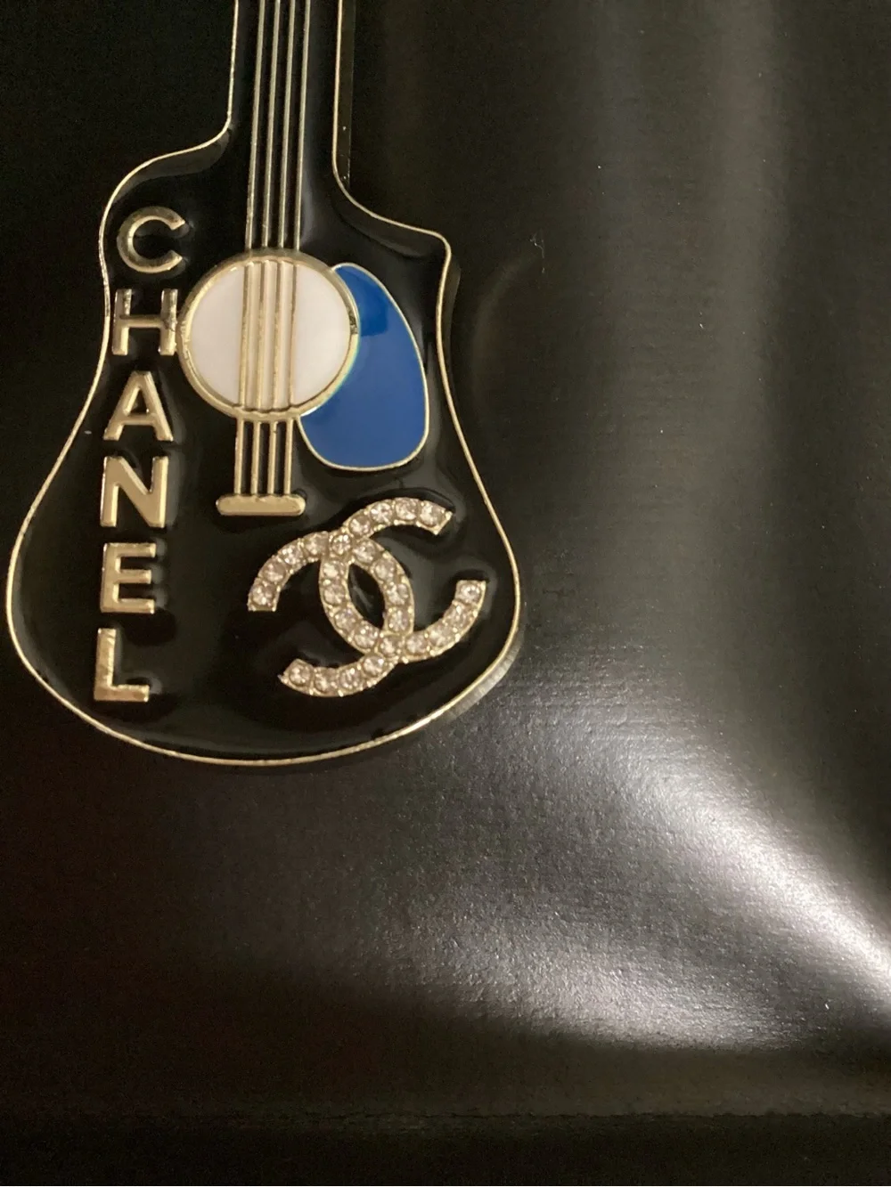 CHANEL guitar shaped