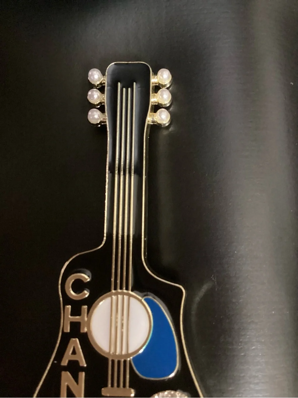 CHANEL guitar shaped