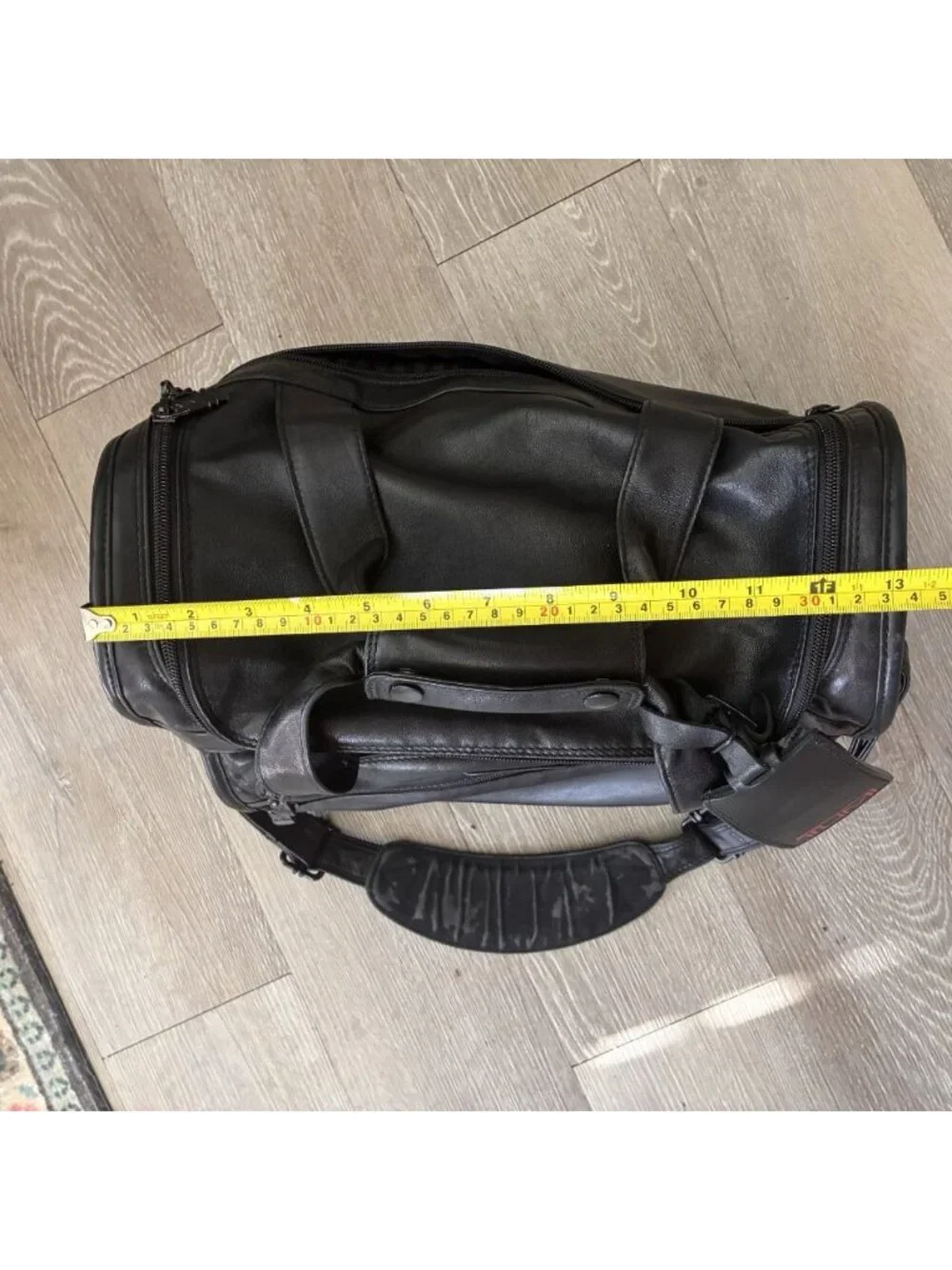 Tumi small leather