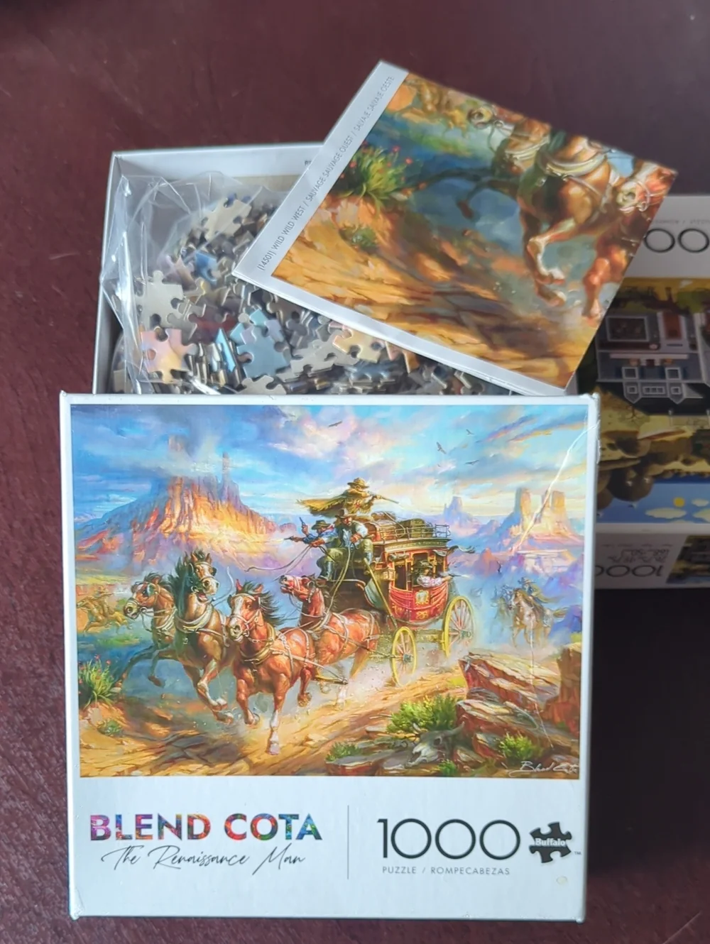 Buffalo Games three puzzles