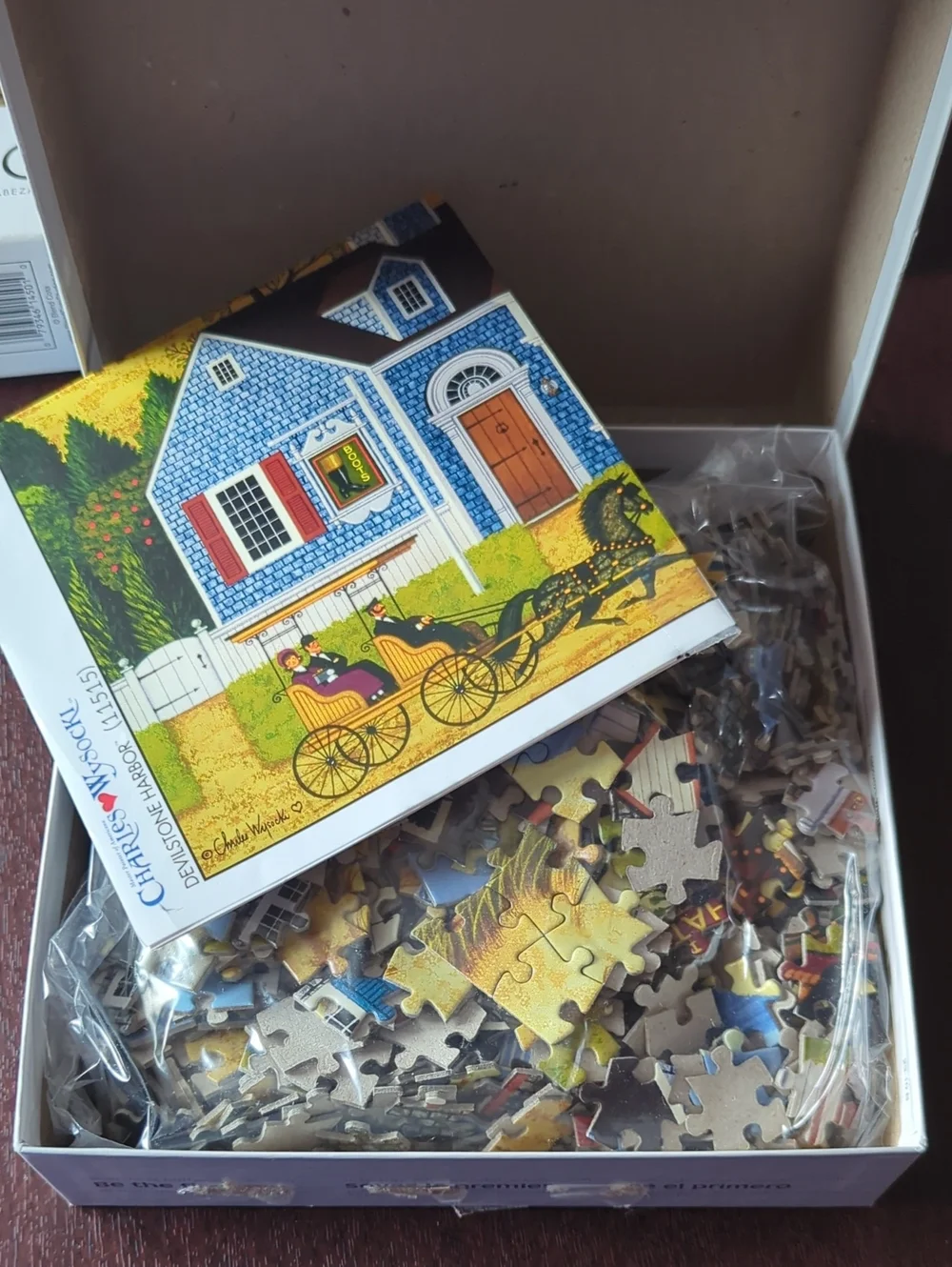 Buffalo Games three puzzles