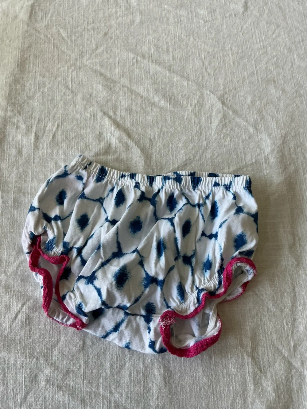 White Diaper Cover with Navy Tie-Dye Spots and Pink Ruffle Trim