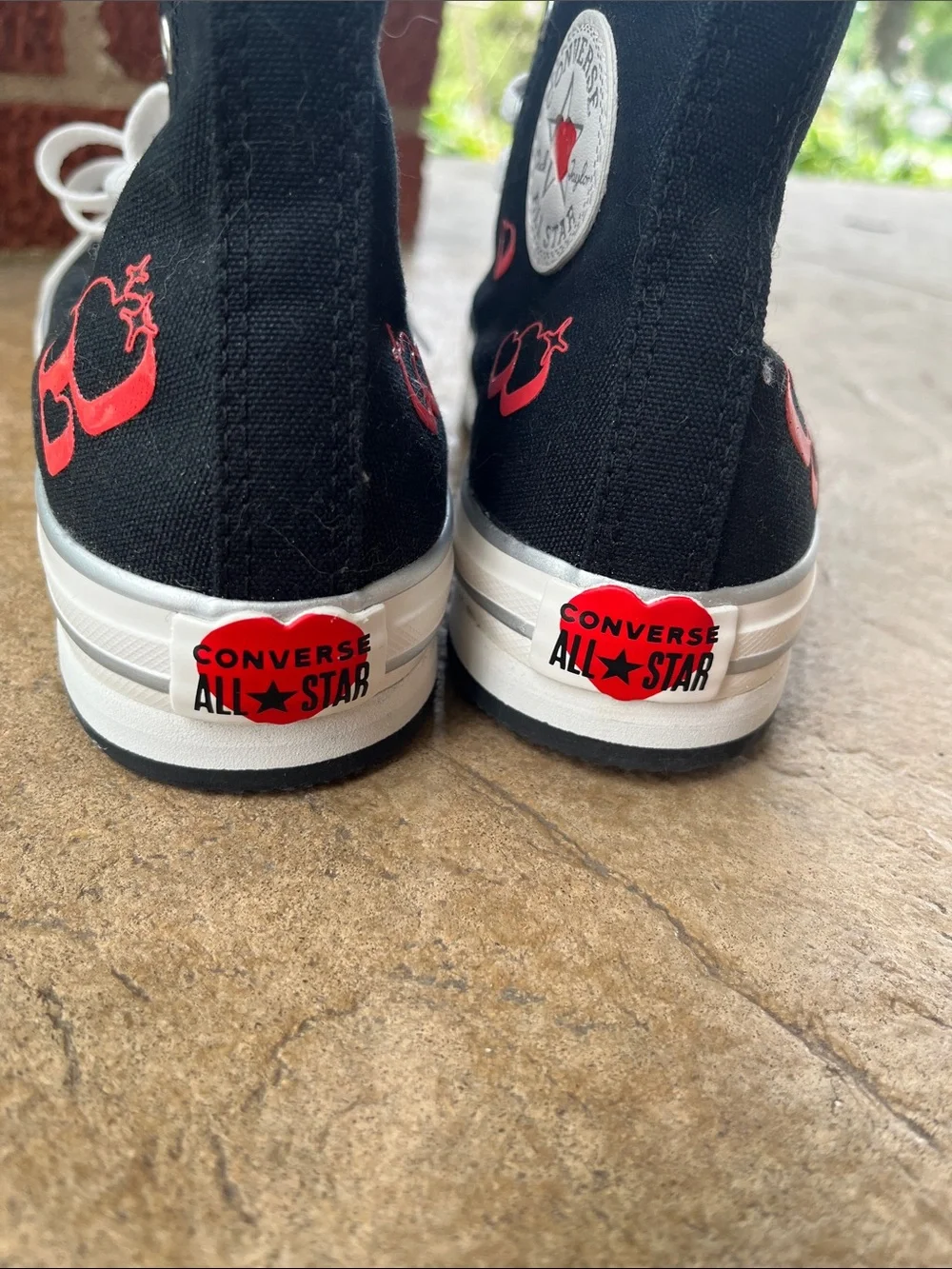 Converse accents sides up