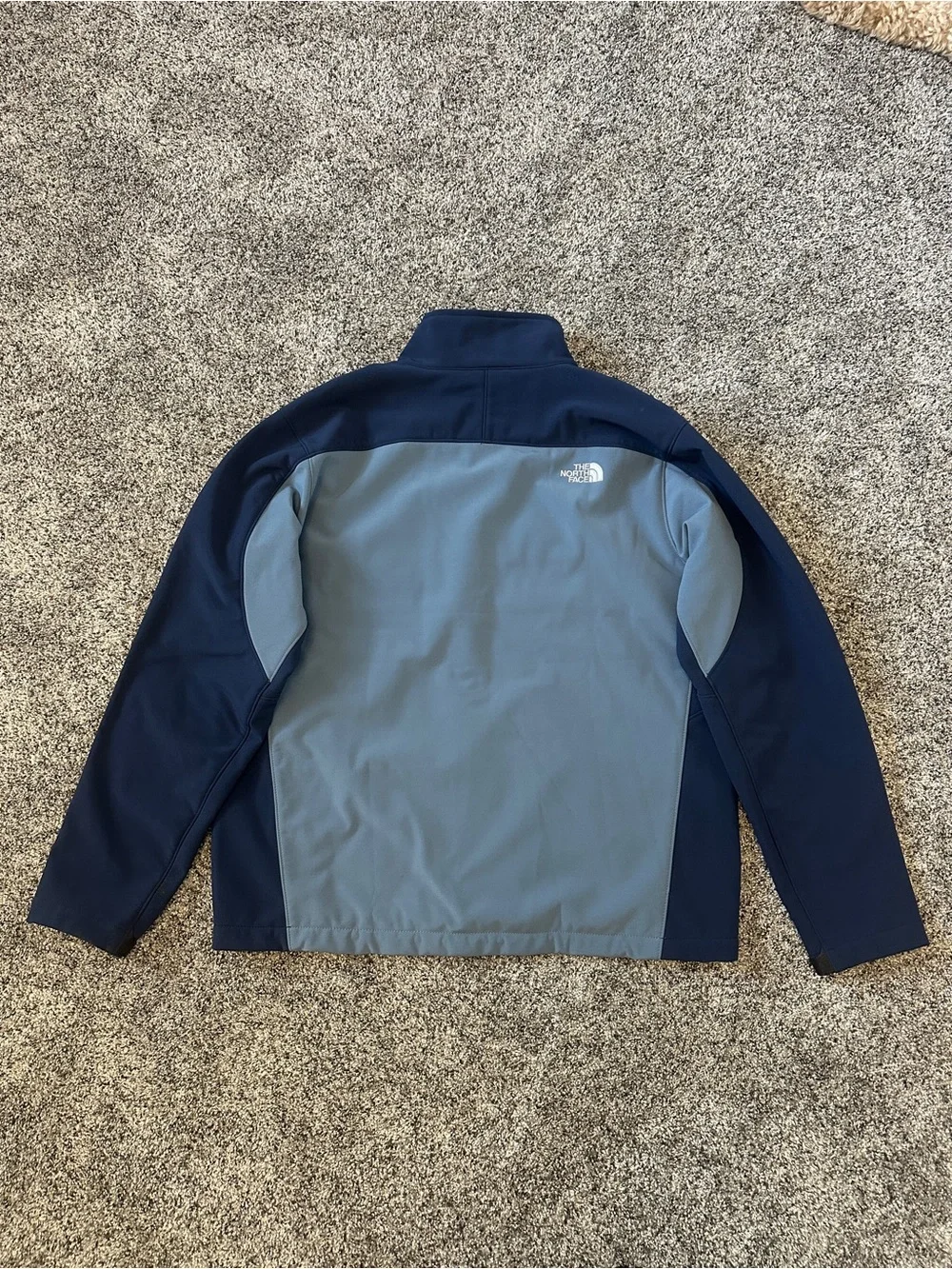The North Face chest zip pockets