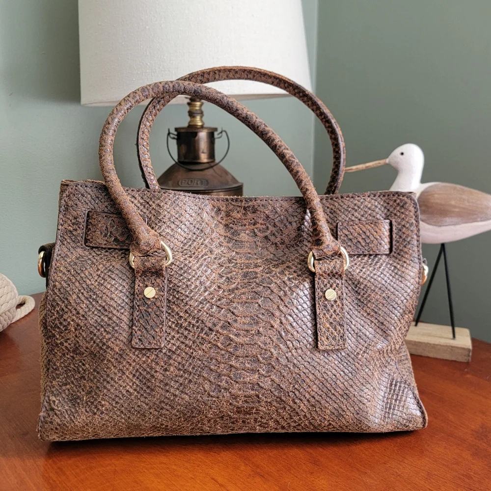 Michael Kors leather has brown