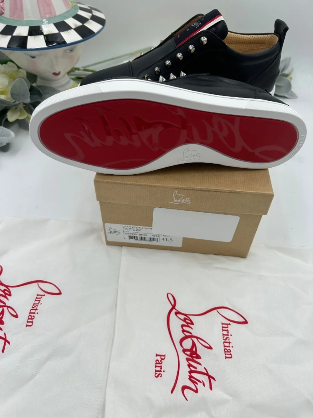 Christian Louboutin signature spikes upper