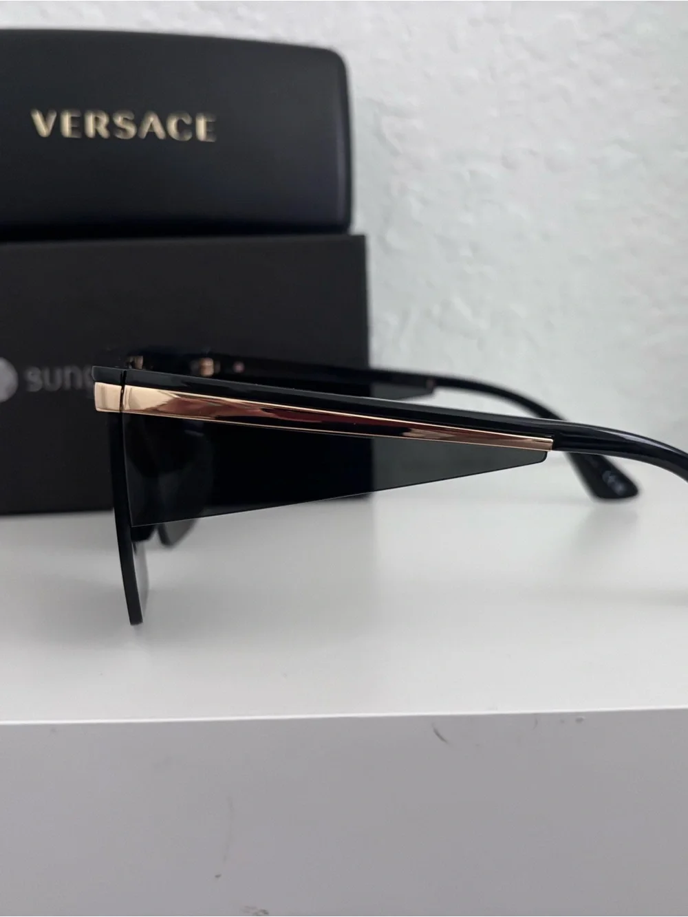 Versace designer shield