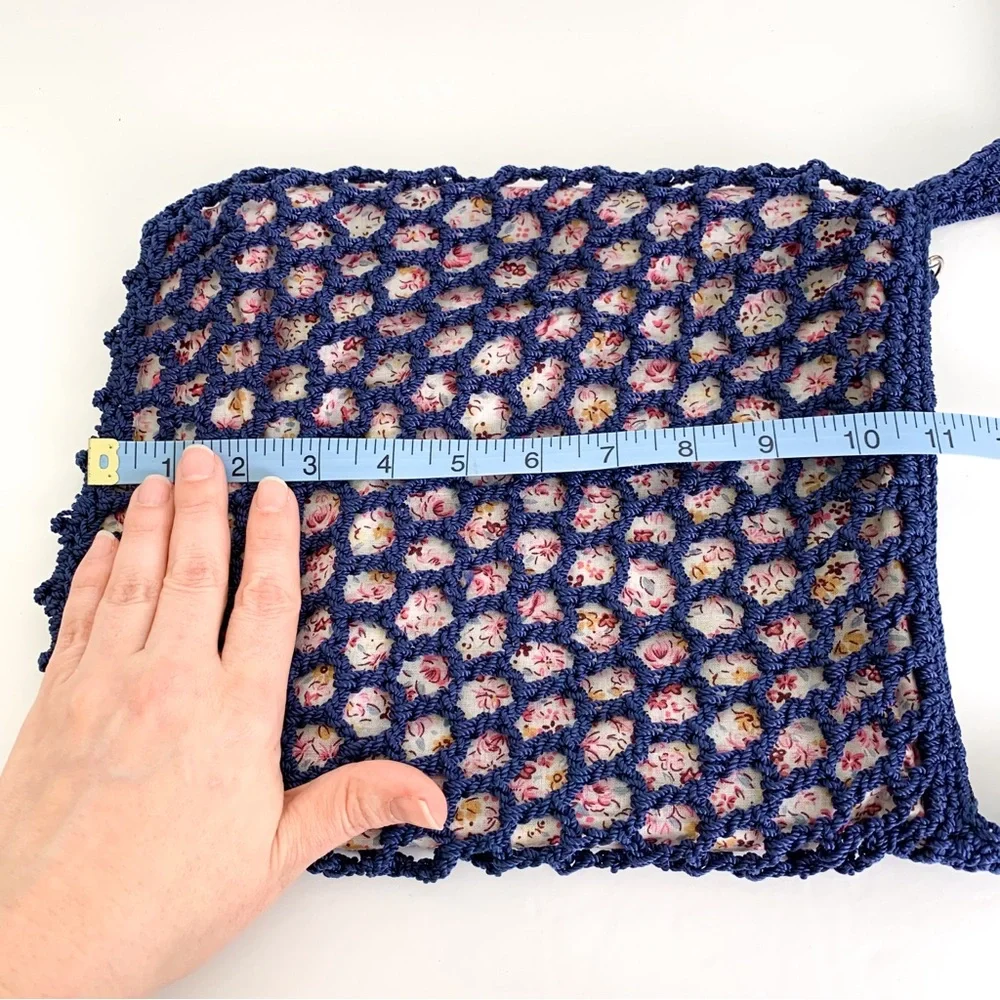 Vintage Mudd crossbody crochet or macrame bag, navy with pink floral lining