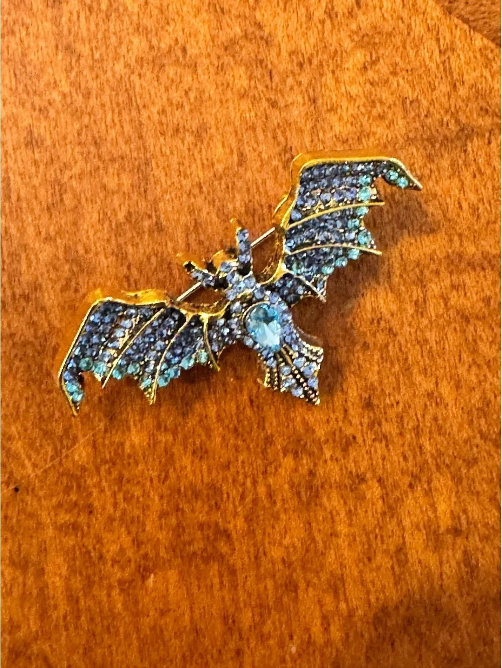 Vintage Blue Rhinestone Bat Brooch Pin with Gold Tone Metal 392