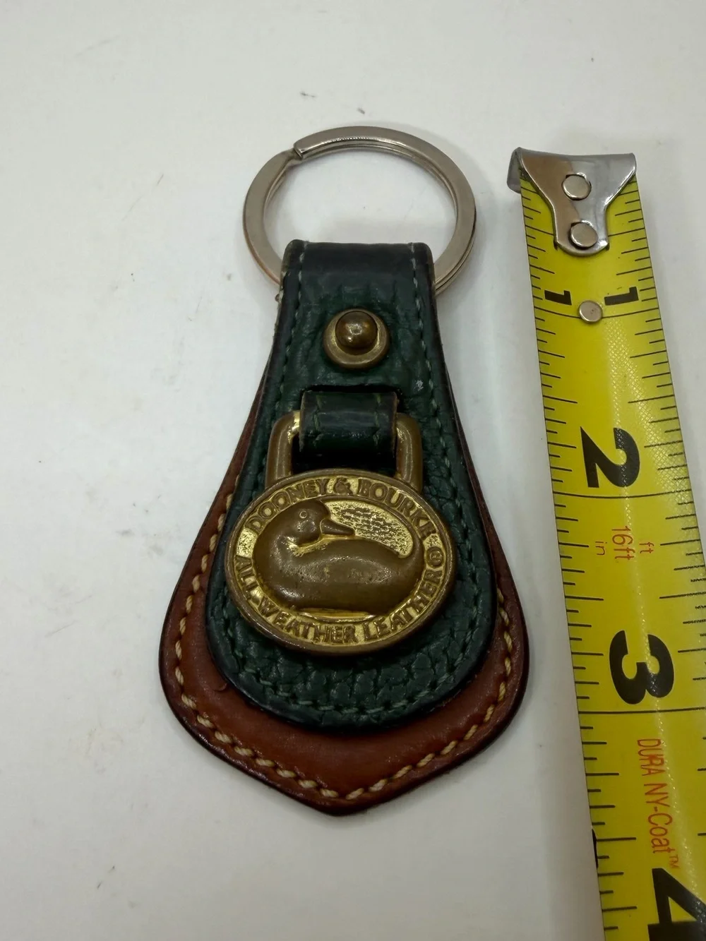 Dooney & Bourke Green and Brown Leather Key Fob with Brass Duck Medallion