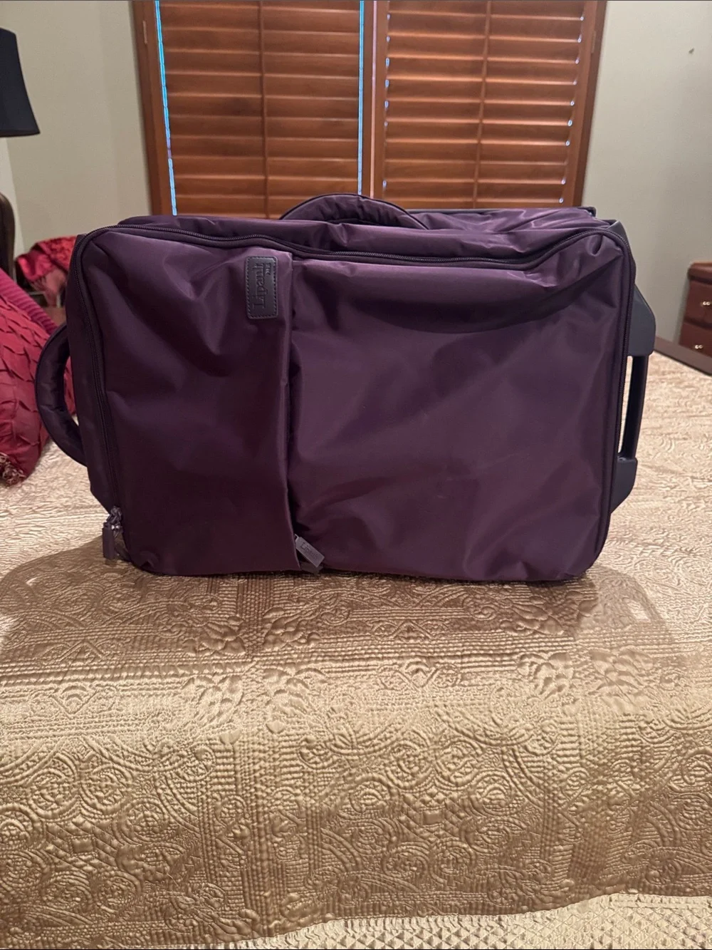 Lipault Men or Wonen’s Rolling Duffel in Deep Plum