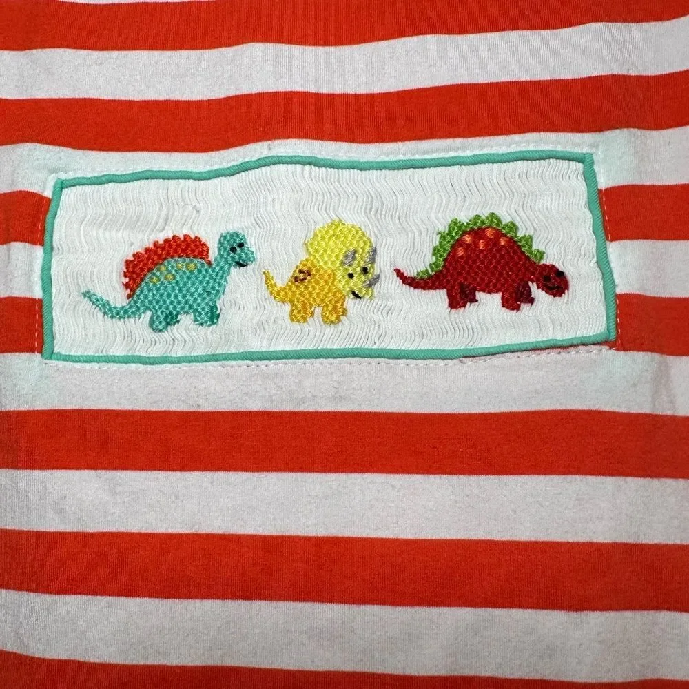Smock dino romper