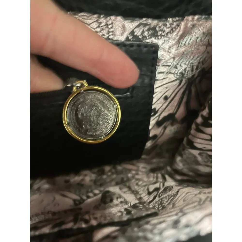 Christian Audigier excellent clutch