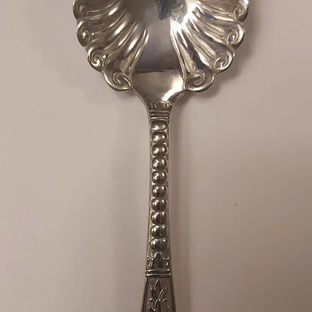 Rogers and Hamilton silver collectible approx
