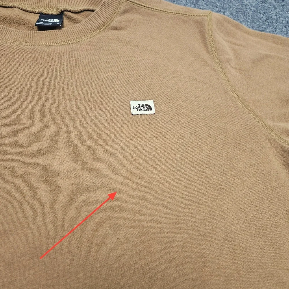 The North Face cosmetic cuffs flaws