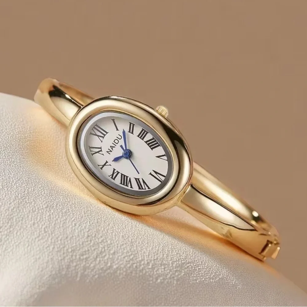 Anthropologie gold blue
