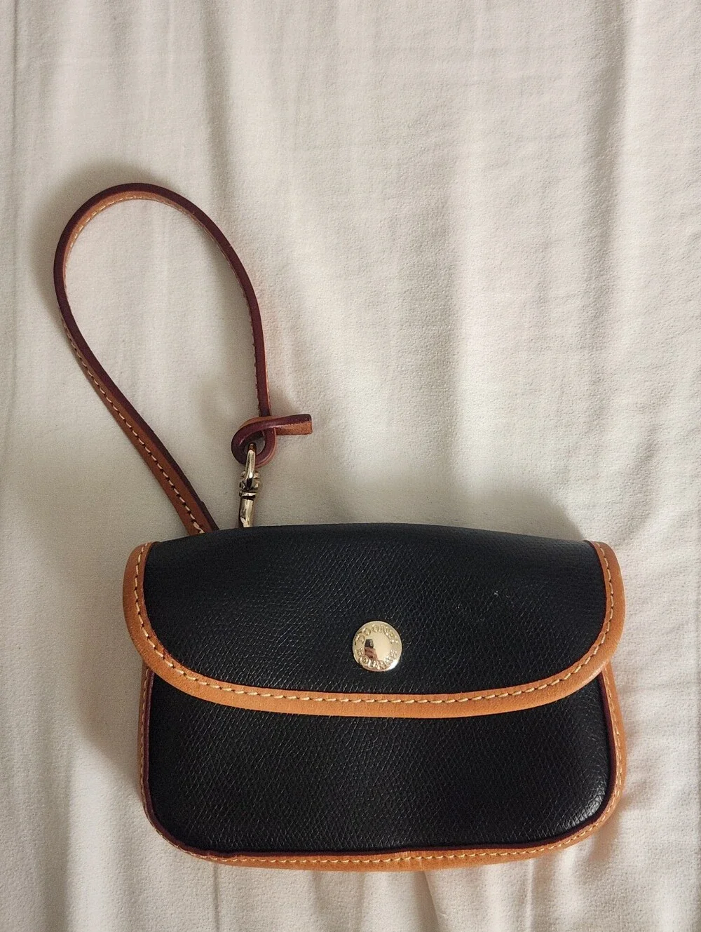 Dooney and Bourke Pebbled Leather Bristol Pouch with Clip Black w Brown Trim