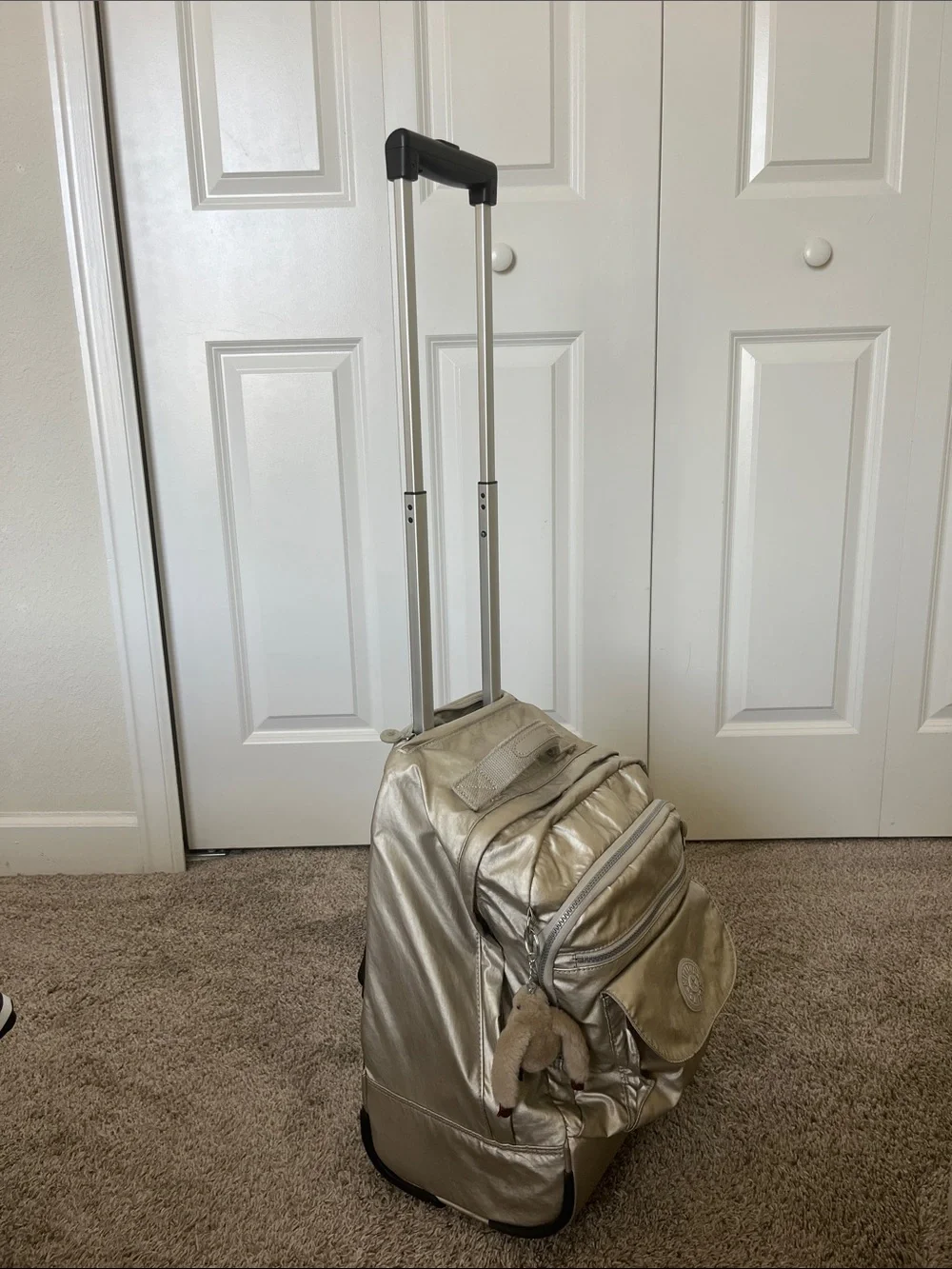 Kipling rolling backpack