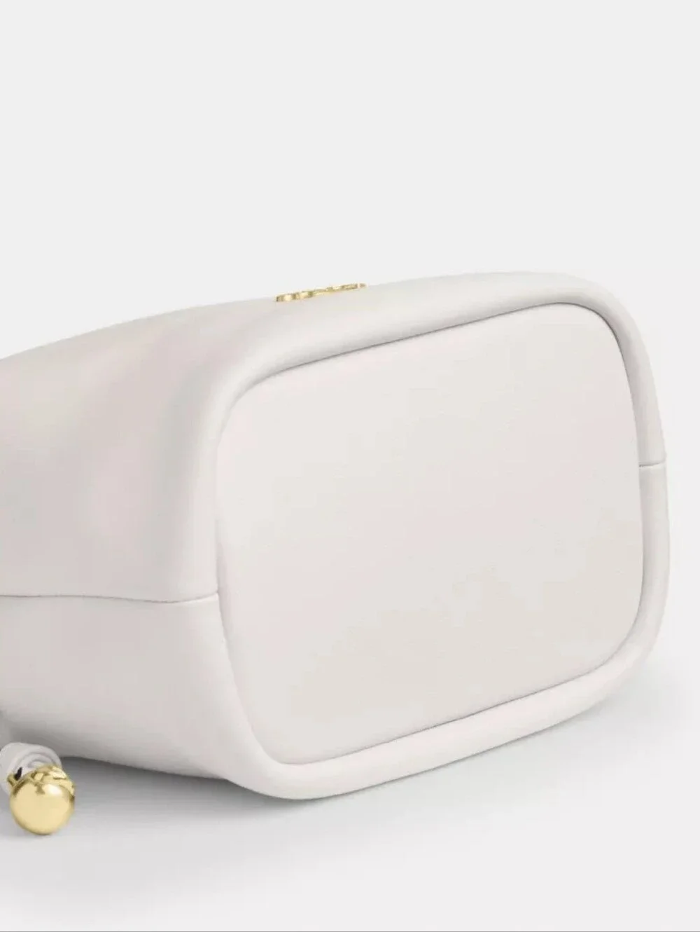 Coach sleek white