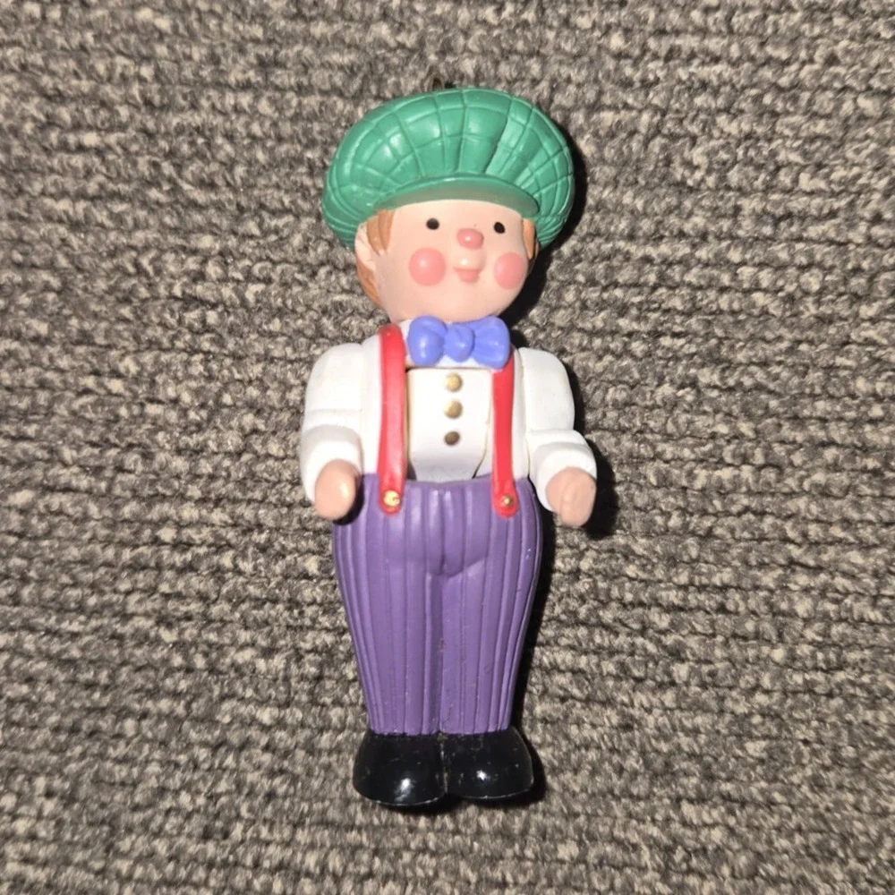 1998 Hallmark Miniature Christmas Ornament Boy Green Hat Purple Pants 2.5