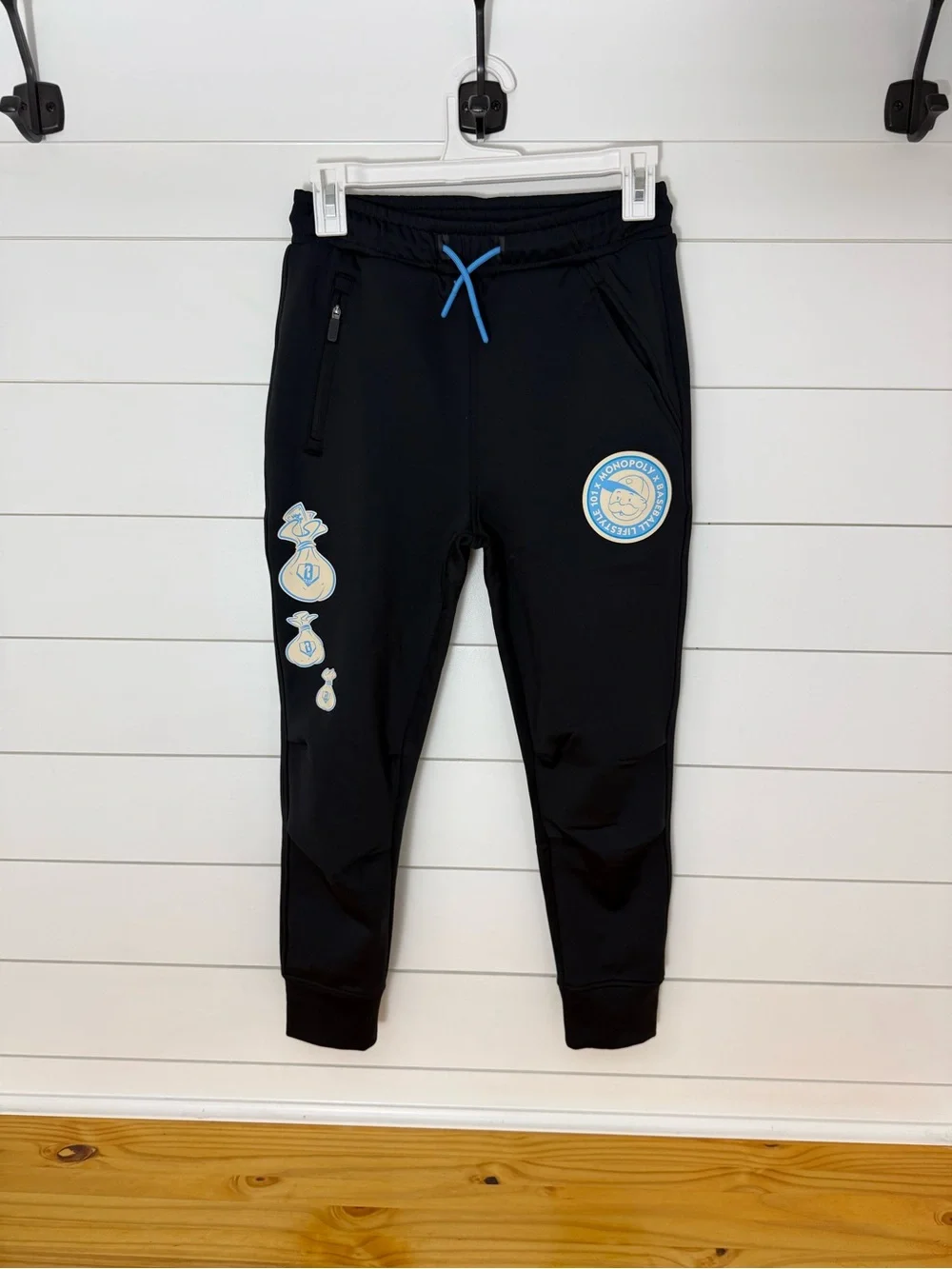 Black Kids Joggers with Light Blue Badge Accents