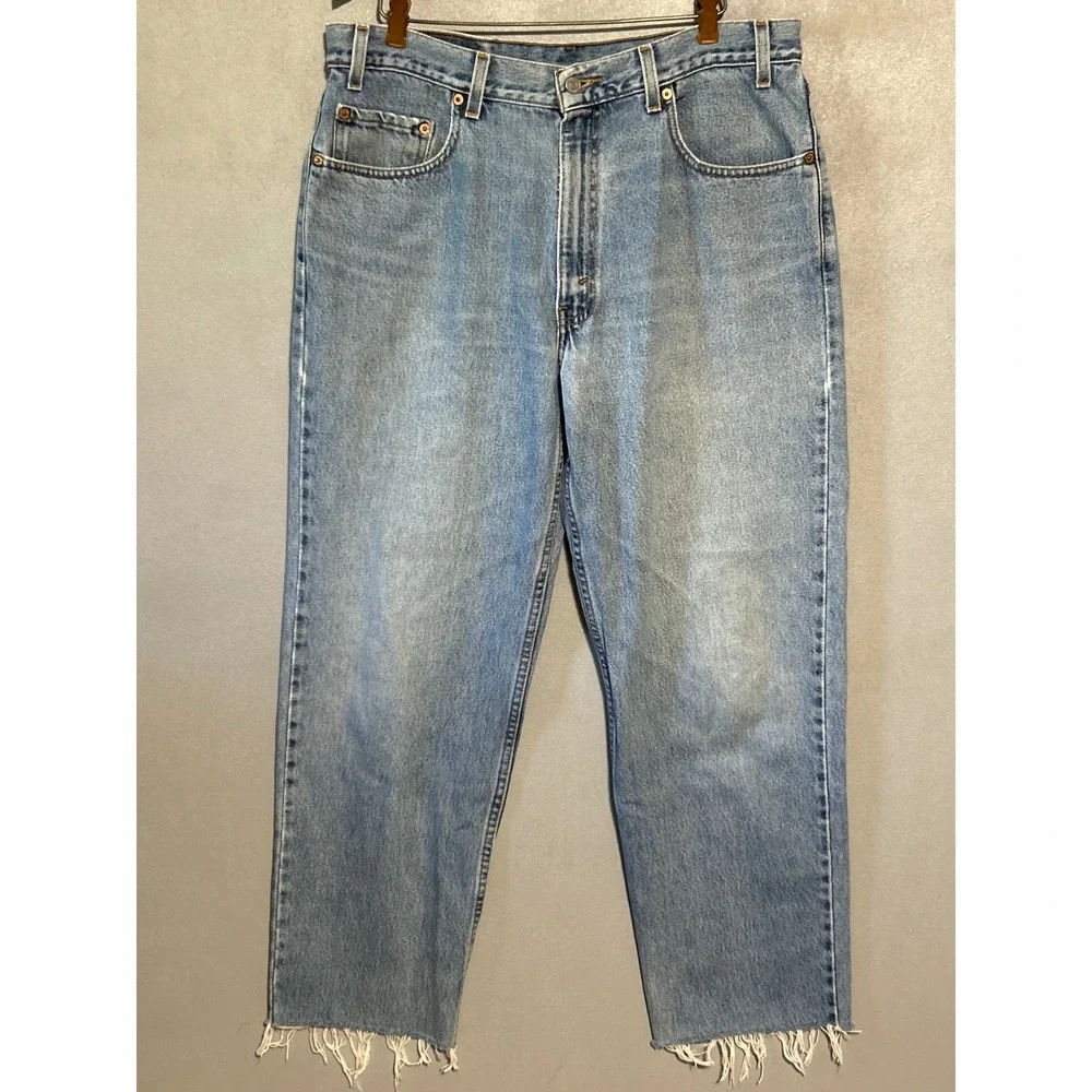Vintage Levis 550 Mens Relaxed Fit Cut Off Frayed Hem Light Wash Jeans 36x28