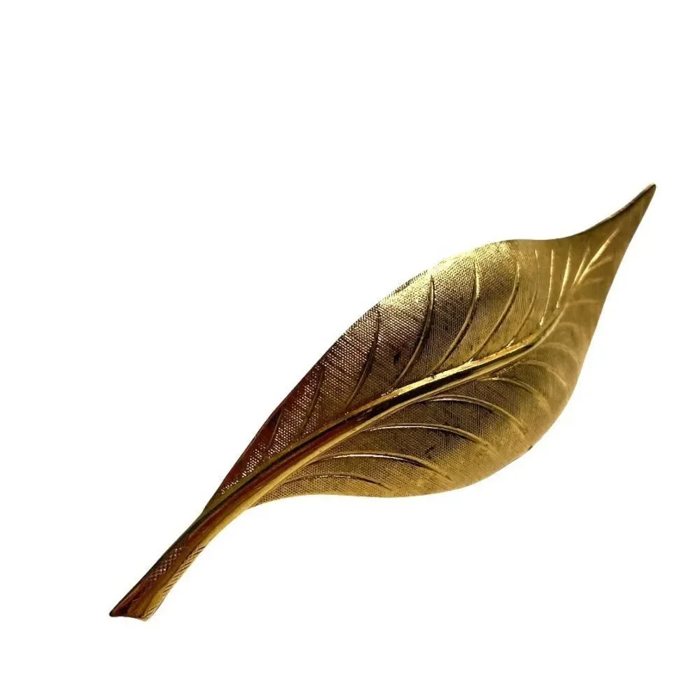 Unmarked vintage leaf