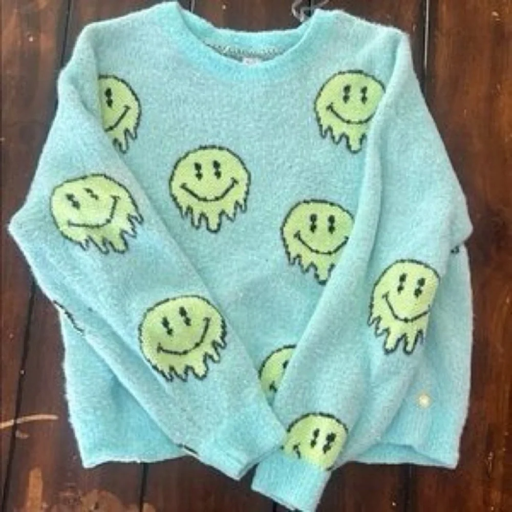 Justice Aqua Smiley Face Sweater