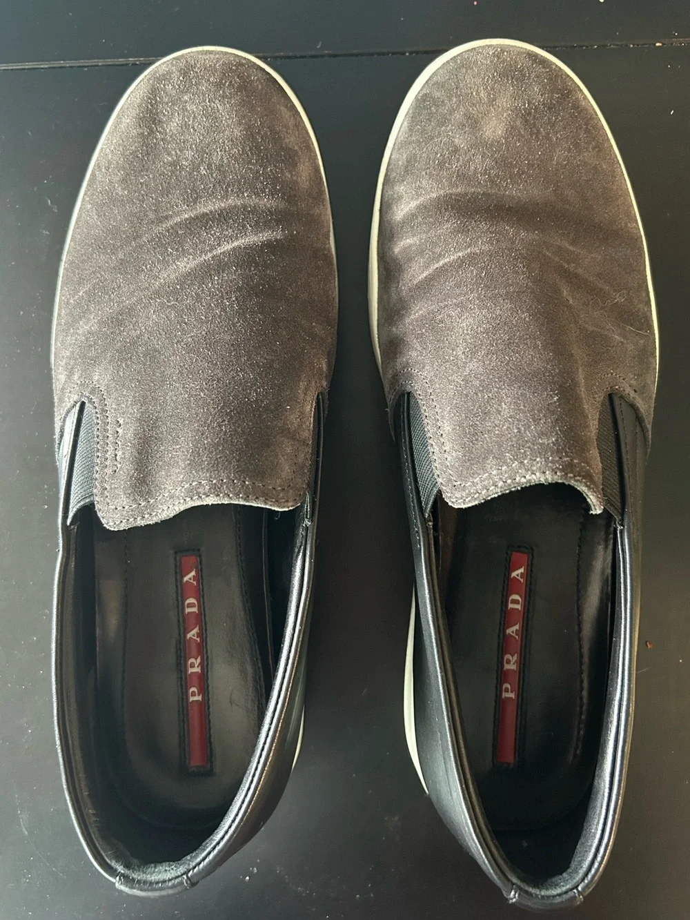 Prada grey suede slip-on sneakers