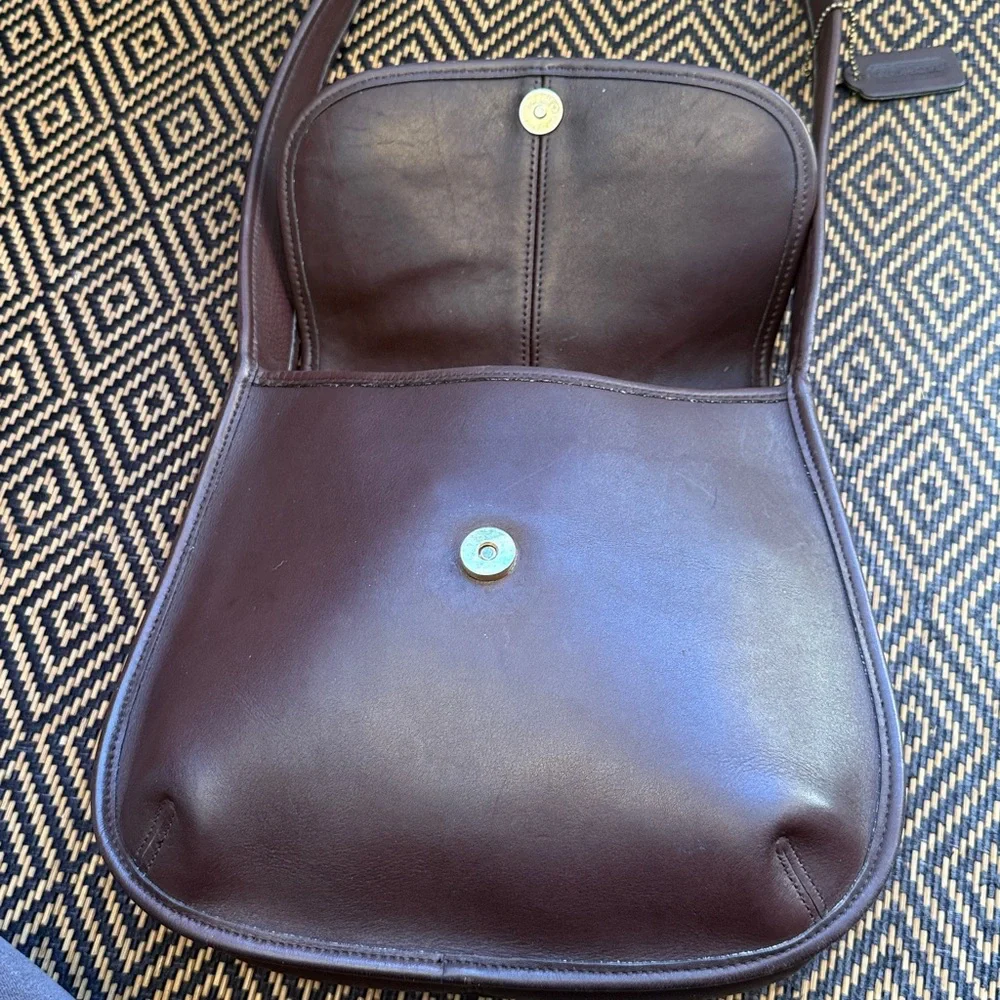 Coach sophisticated dark