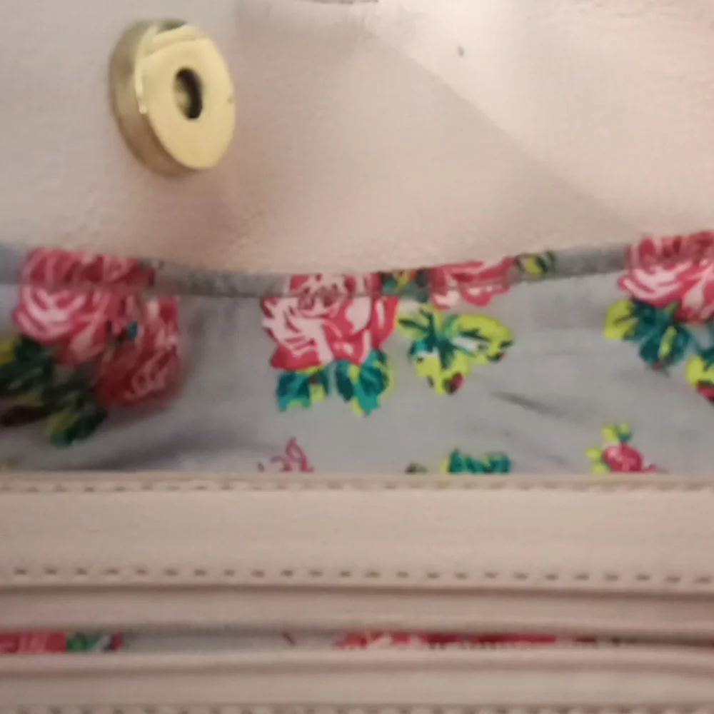 Betsey Johnson questions bag flawless