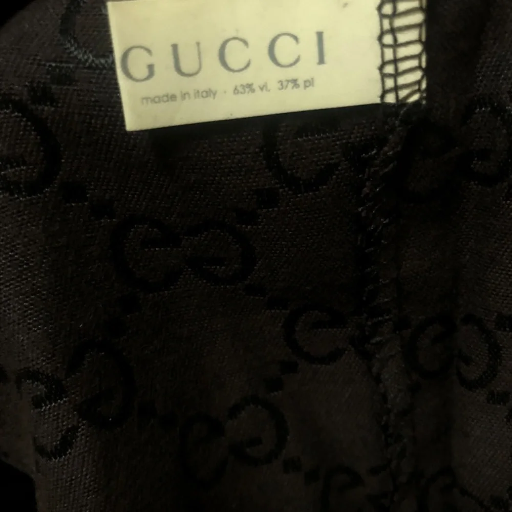 Gucci please see