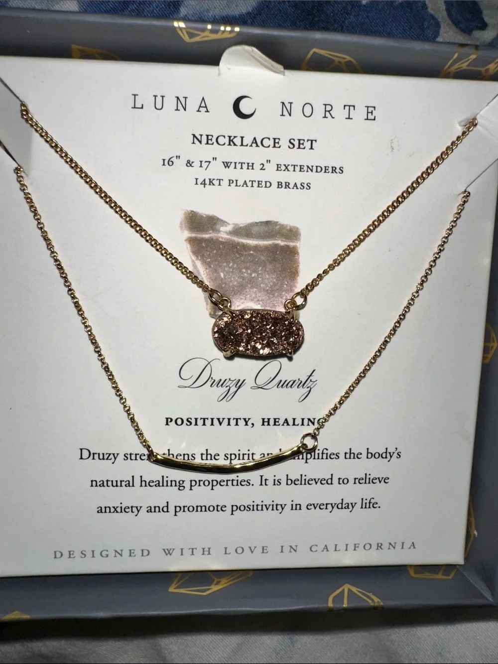 Luna Norte 14kt gold-plated brass layered necklace set features a sparkling
