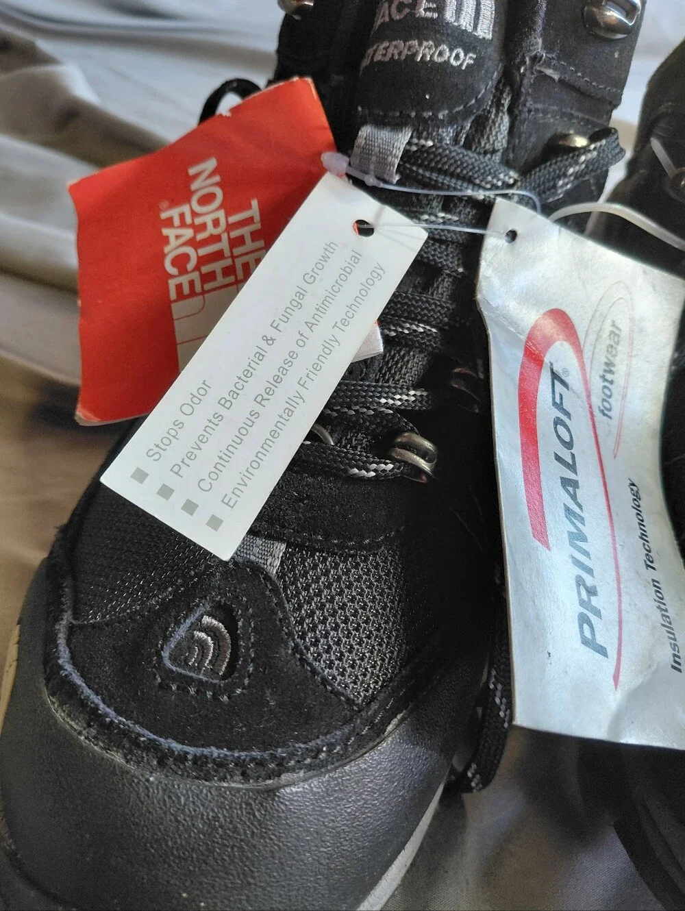 The North Face eyelets secure closure