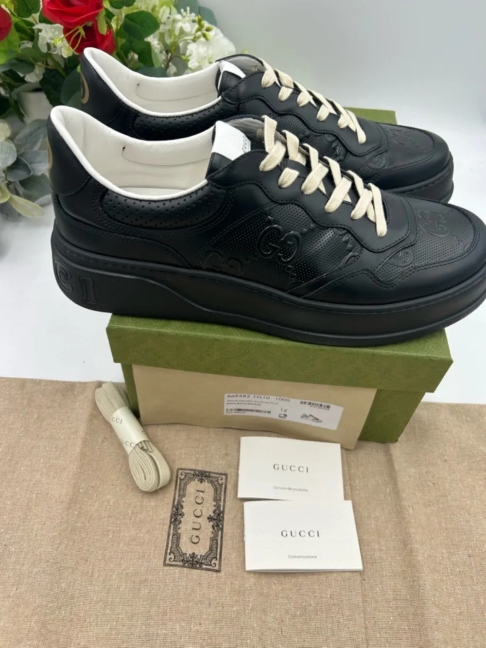 Men’s Gucci GG Embossed Leather Sneakers. Size 12. Made in Italy.